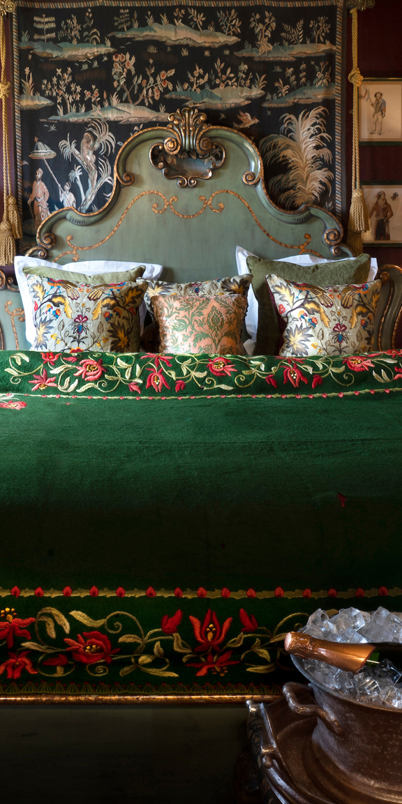 Green velvet bedding, Champagne and antiques in Room 16 at Prestonfield House 5 star hotel